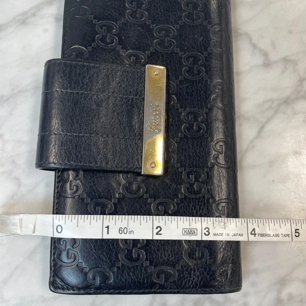 Gucci Black Embossed GG Leather Wallet with Gold Nameplate
